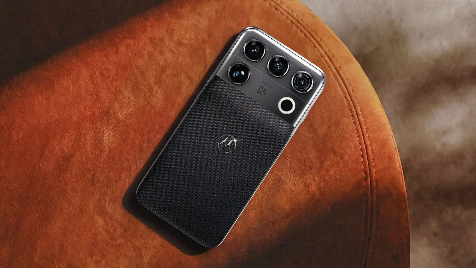 Motorola Signature 27 held in the hand.